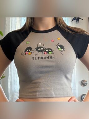 Black & Gray Raglan Crop Top with Soot Sprite Graphic